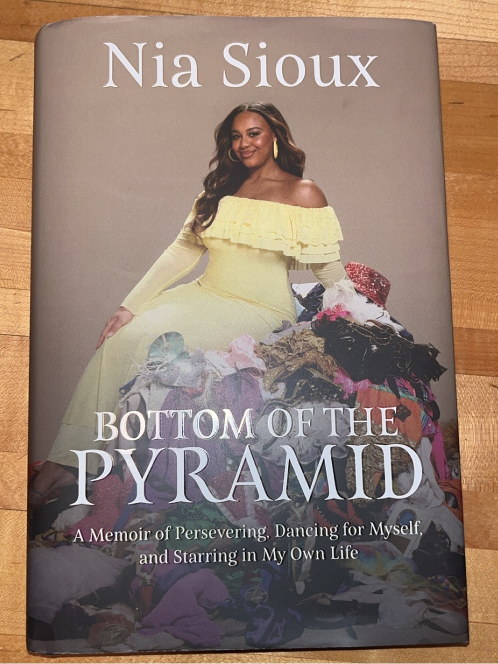 Nia Sioux "Bottom of the Pyramid" Hardcover Book